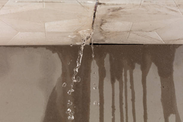 Professional Flood Damage Cleanup technician working in Reno, PA